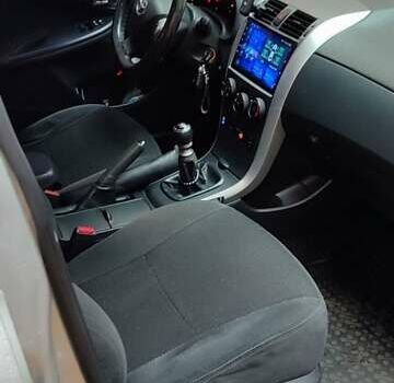 Серый Тойота Королла, объемом двигателя 1.3 л и пробегом 169 тыс. км за 7500 $, фото 22 на Automoto.ua