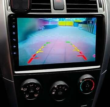 Серый Тойота Королла, объемом двигателя 1.33 л и пробегом 169 тыс. км за 7500 $, фото 10 на Automoto.ua