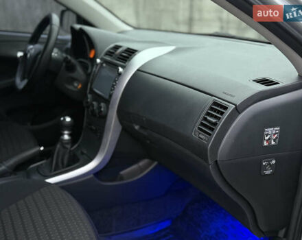 Сірий Тойота Королла, об'ємом двигуна 1.33 л та пробігом 138 тис. км за 7650 $, фото 29 на Automoto.ua