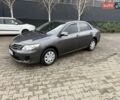 Серый Тойота Королла, объемом двигателя 1.33 л и пробегом 235 тыс. км за 7850 $, фото 1 на Automoto.ua