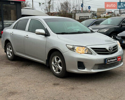 Серый Тойота Королла, объемом двигателя 1.3 л и пробегом 137 тыс. км за 7490 $, фото 2 на Automoto.ua