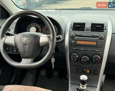Серый Тойота Королла, объемом двигателя 1.3 л и пробегом 137 тыс. км за 7490 $, фото 21 на Automoto.ua