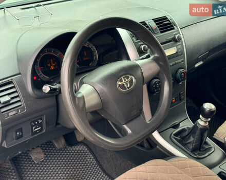 Серый Тойота Королла, объемом двигателя 1.3 л и пробегом 137 тыс. км за 7490 $, фото 14 на Automoto.ua