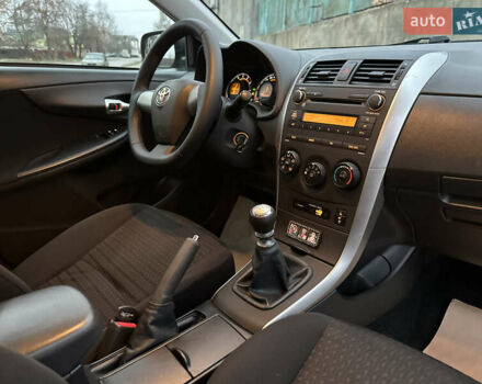 Серый Тойота Королла, объемом двигателя 1.33 л и пробегом 154 тыс. км за 7800 $, фото 12 на Automoto.ua