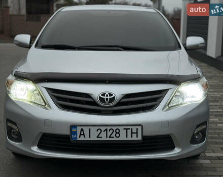 Сірий Тойота Королла, об'ємом двигуна 1.33 л та пробігом 138 тис. км за 7650 $, фото 4 на Automoto.ua