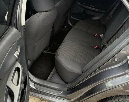 Серый Тойота Королла, объемом двигателя 1.33 л и пробегом 235 тыс. км за 7850 $, фото 29 на Automoto.ua