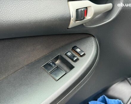 Сірий Тойота Королла, об'ємом двигуна 1.3 л та пробігом 137 тис. км за 7490 $, фото 11 на Automoto.ua