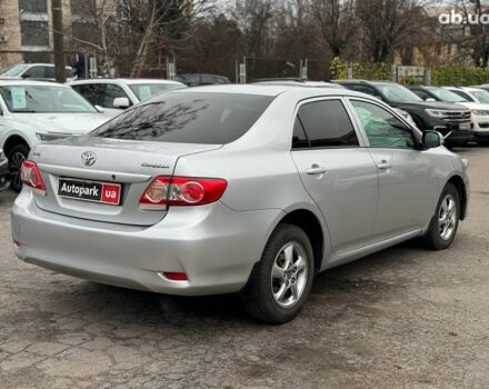 Сірий Тойота Королла, об'ємом двигуна 1.3 л та пробігом 137 тис. км за 7490 $, фото 4 на Automoto.ua