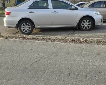 Сірий Тойота Королла, об'ємом двигуна 1.33 л та пробігом 156 тис. км за 9000 $, фото 1 на Automoto.ua