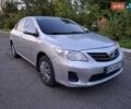 Серый Тойота Королла, объемом двигателя 1.33 л и пробегом 248 тыс. км за 5950 $, фото 2 на Automoto.ua
