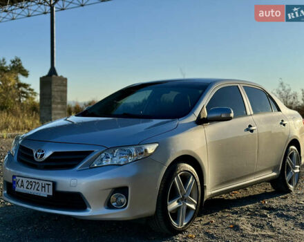 Серый Тойота Королла, объемом двигателя 1.6 л и пробегом 265 тыс. км за 7899 $, фото 2 на Automoto.ua