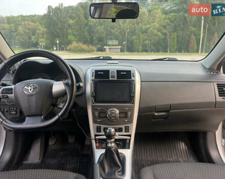 Сірий Тойота Королла, об'ємом двигуна 1.6 л та пробігом 234 тис. км за 8500 $, фото 7 на Automoto.ua