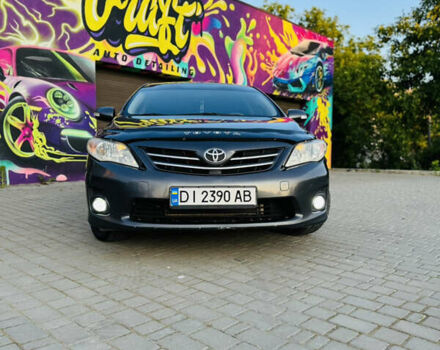 Сірий Тойота Королла, об'ємом двигуна 1.6 л та пробігом 280 тис. км за 6899 $, фото 4 на Automoto.ua