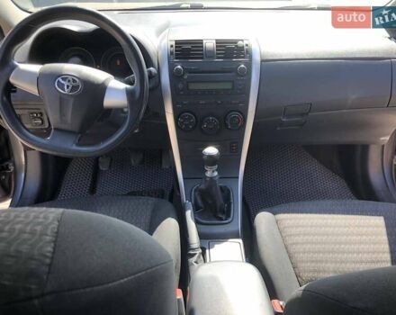 Сірий Тойота Королла, об'ємом двигуна 1.33 л та пробігом 174 тис. км за 7500 $, фото 8 на Automoto.ua