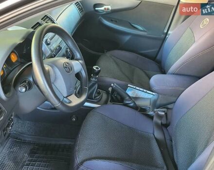Серый Тойота Королла, объемом двигателя 1.33 л и пробегом 177 тыс. км за 7500 $, фото 12 на Automoto.ua