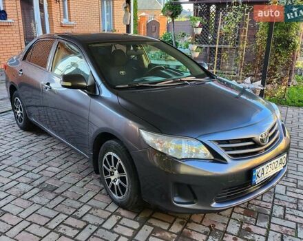 Серый Тойота Королла, объемом двигателя 1.33 л и пробегом 177 тыс. км за 7500 $, фото 1 на Automoto.ua