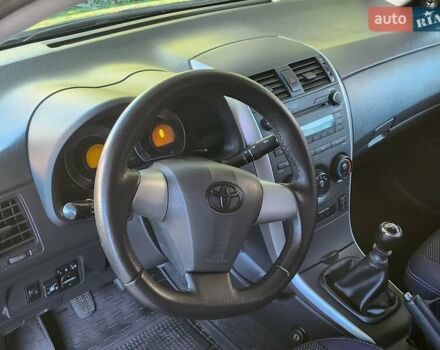 Серый Тойота Королла, объемом двигателя 1.33 л и пробегом 177 тыс. км за 7500 $, фото 14 на Automoto.ua