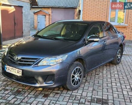 Серый Тойота Королла, объемом двигателя 1.33 л и пробегом 177 тыс. км за 7500 $, фото 16 на Automoto.ua