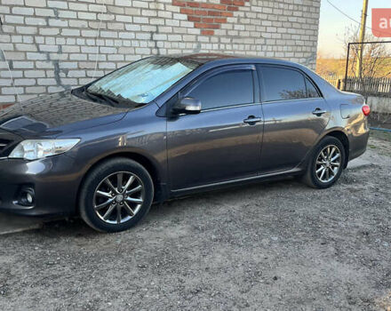 Сірий Тойота Королла, об'ємом двигуна 1.6 л та пробігом 240 тис. км за 9200 $, фото 5 на Automoto.ua