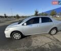 Серый Тойота Королла, объемом двигателя 1.33 л и пробегом 134 тыс. км за 8900 $, фото 1 на Automoto.ua