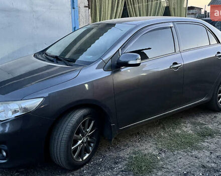 Сірий Тойота Королла, об'ємом двигуна 1.6 л та пробігом 240 тис. км за 9200 $, фото 1 на Automoto.ua