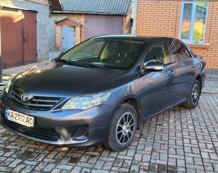 Сірий Тойота Королла, об'ємом двигуна 1.3 л та пробігом 177 тис. км за 7500 $, фото 1 на Automoto.ua