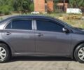 Сірий Тойота Королла, об'ємом двигуна 1.33 л та пробігом 121 тис. км за 8399 $, фото 1 на Automoto.ua