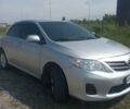 Сірий Тойота Королла, об'ємом двигуна 1.3 л та пробігом 183 тис. км за 7400 $, фото 1 на Automoto.ua