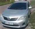 Сірий Тойота Королла, об'ємом двигуна 1.33 л та пробігом 240 тис. км за 6200 $, фото 1 на Automoto.ua