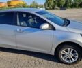 Серый Тойота Королла, объемом двигателя 1.33 л и пробегом 147 тыс. км за 9400 $, фото 1 на Automoto.ua