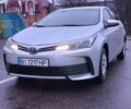 Сірий Тойота Королла, об'ємом двигуна 1.33 л та пробігом 133 тис. км за 10900 $, фото 1 на Automoto.ua