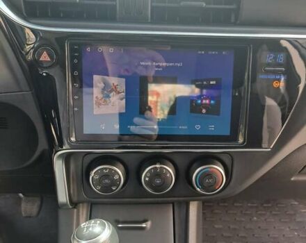 Серый Тойота Королла, объемом двигателя 1.6 л и пробегом 111 тыс. км за 11900 $, фото 8 на Automoto.ua