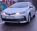 Серый Тойота Королла, объемом двигателя 1.33 л и пробегом 133 тыс. км за 10900 $, фото 1 на Automoto.ua