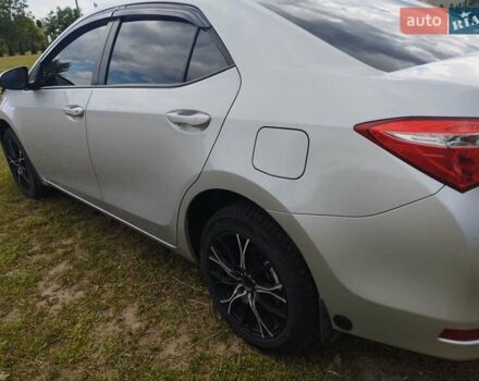 Сірий Тойота Королла, об'ємом двигуна 1.6 л та пробігом 242 тис. км за 13599 $, фото 2 на Automoto.ua