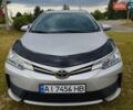 Сірий Тойота Королла, об'ємом двигуна 1.6 л та пробігом 242 тис. км за 13599 $, фото 5 на Automoto.ua