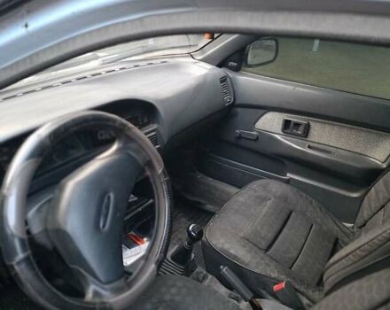 Серый Тойота Королла, объемом двигателя 1.3 л и пробегом 399 тыс. км за 1700 $, фото 2 на Automoto.ua