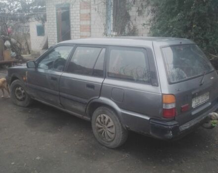 Серый Тойота Королла, объемом двигателя 1.3 л и пробегом 320 тыс. км за 544 $, фото 1 на Automoto.ua