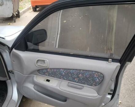 Серый Тойота Королла, объемом двигателя 1.33 л и пробегом 289 тыс. км за 3600 $, фото 4 на Automoto.ua