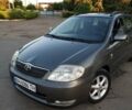 Сірий Тойота Королла, об'ємом двигуна 2 л та пробігом 231 тис. км за 4800 $, фото 1 на Automoto.ua
