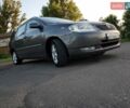 Сірий Тойота Королла, об'ємом двигуна 2 л та пробігом 231 тис. км за 4800 $, фото 2 на Automoto.ua