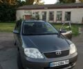 Сірий Тойота Королла, об'ємом двигуна 2 л та пробігом 231 тис. км за 4800 $, фото 3 на Automoto.ua