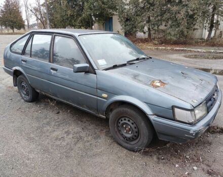 Серый Тойота Королла, объемом двигателя 1.3 л и пробегом 300 тыс. км за 238 $, фото 8 на Automoto.ua