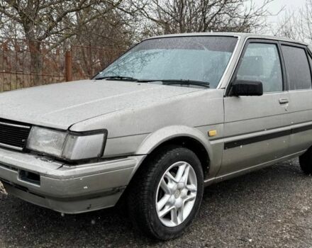 Серый Тойота Королла, объемом двигателя 1.5 л и пробегом 390 тыс. км за 823 $, фото 1 на Automoto.ua