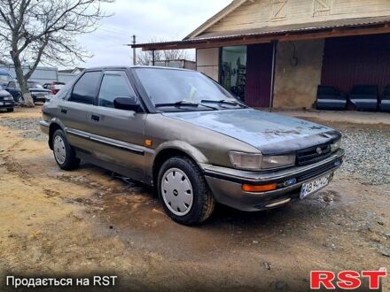 Серый Тойота Королла, объемом двигателя 1.3 л и пробегом 236 тыс. км за 900 $, фото 1 на Automoto.ua