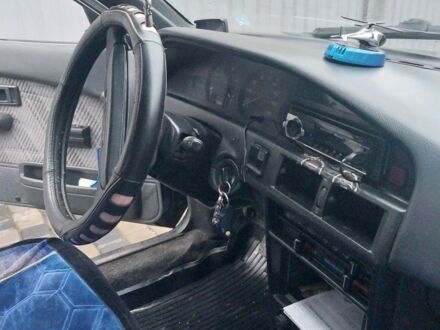 Серый Тойота Королла, объемом двигателя 1.3 л и пробегом 380 тыс. км за 1184 $, фото 1 на Automoto.ua