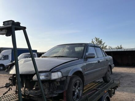 Серый Тойота Королла, объемом двигателя 1.6 л и пробегом 235 тыс. км за 650 $, фото 1 на Automoto.ua