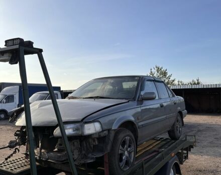 Серый Тойота Королла, объемом двигателя 1.6 л и пробегом 235 тыс. км за 650 $, фото 1 на Automoto.ua