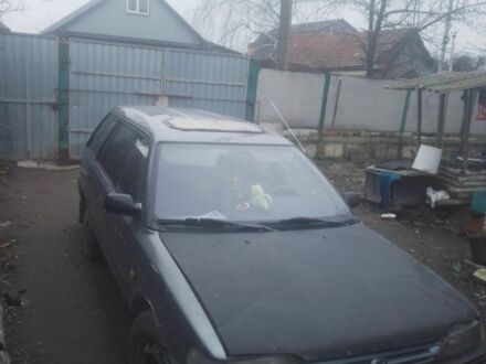 Сірий Тойота Королла, об'ємом двигуна 1.3 л та пробігом 320 тис. км за 544 $, фото 1 на Automoto.ua