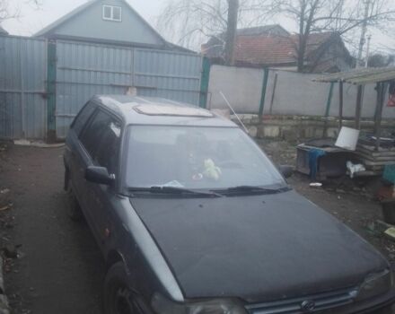 Серый Тойота Королла, объемом двигателя 1.3 л и пробегом 320 тыс. км за 523 $, фото 1 на Automoto.ua