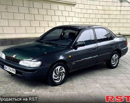 Серый Тойота Королла, объемом двигателя 1.3 л и пробегом 355 тыс. км за 1400 $, фото 1 на Automoto.ua